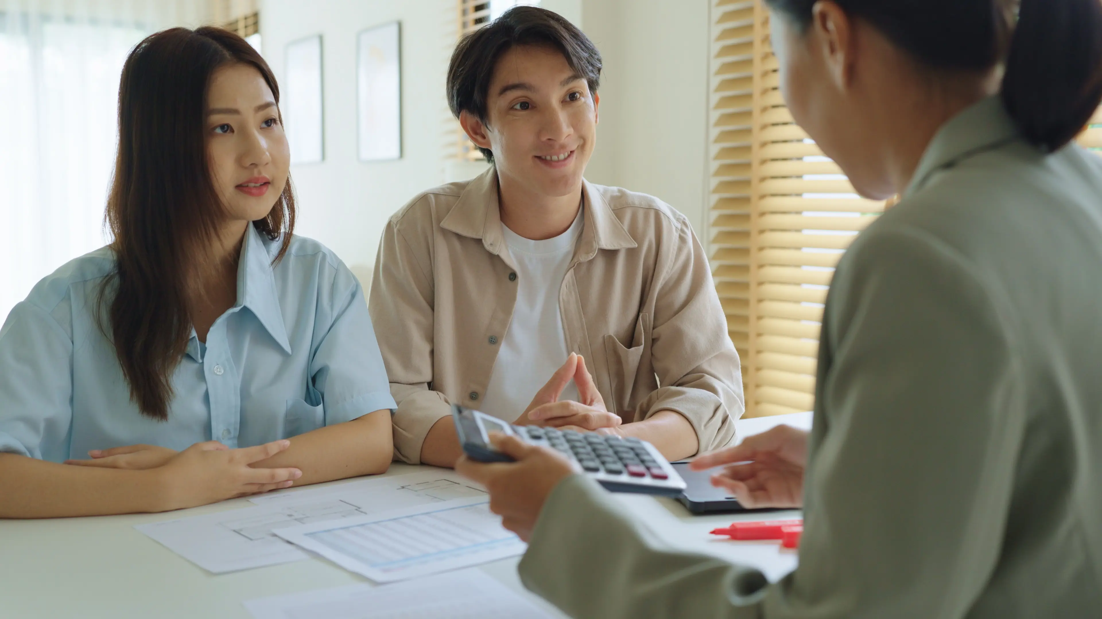 People discussing finances with a consultant.